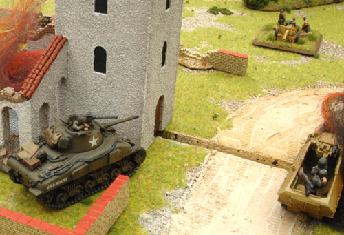 The Sherman takes cover behind the bell tower