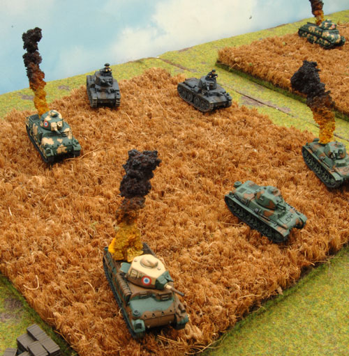The Panzer 38(t)s work their way further up the flank