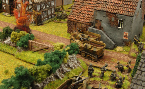 The Panzergrenadiers creep up to the Village gate