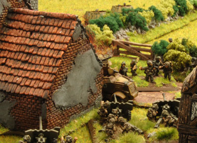 The Panzergrenadiers advance on the village