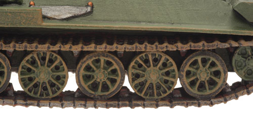 Tracks with a mix of rubber and steel rimmed wheels