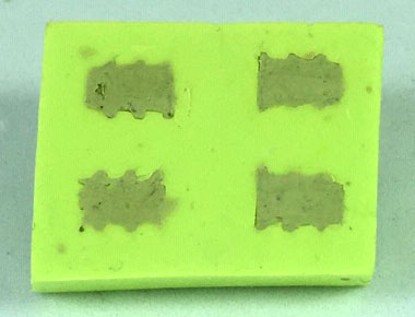 Milliput putty pressed into the mould