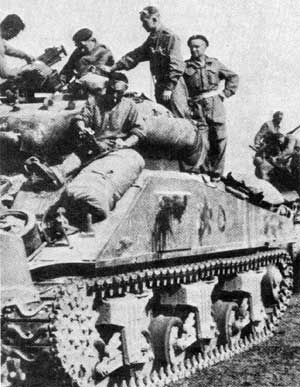 Polish Tankers at rest on their M4 Sherman